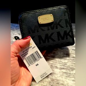 Michael Kors wallet with matching purse.